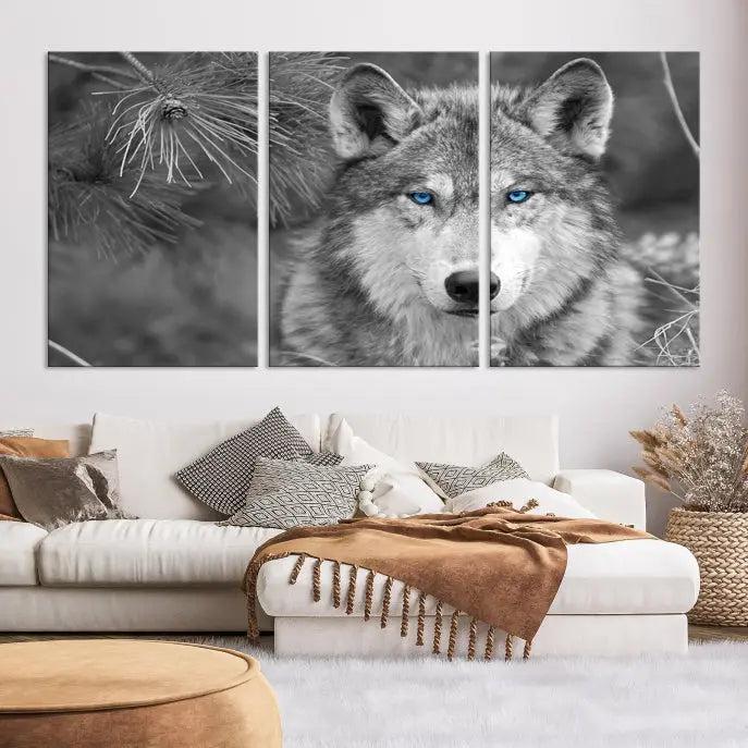 Displayed on the wall is the Wild Wolf Blue Eye Wall Art Canvas Print, a museum-quality triptych featuring a wolf with piercing blue eyes.