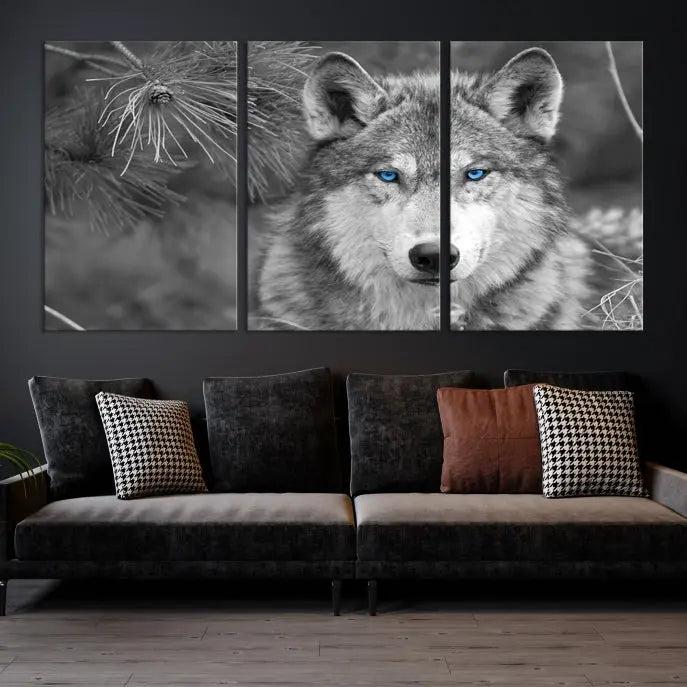 Displayed on the wall is the Wild Wolf Blue Eye Wall Art Canvas Print, a museum-quality triptych featuring a wolf with piercing blue eyes.