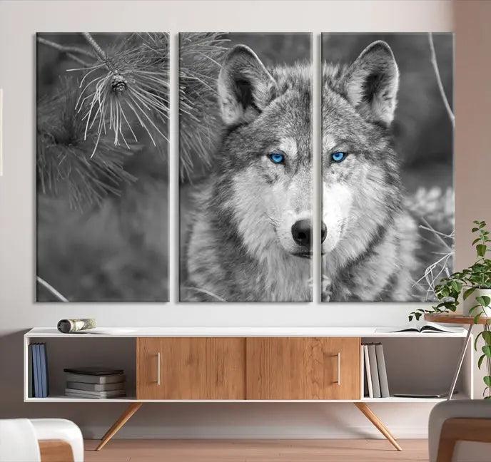 Displayed on the wall is the Wild Wolf Blue Eye Wall Art Canvas Print, a museum-quality triptych featuring a wolf with piercing blue eyes.