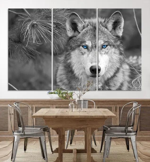 Displayed on the wall is the Wild Wolf Blue Eye Wall Art Canvas Print, a museum-quality triptych featuring a wolf with piercing blue eyes.