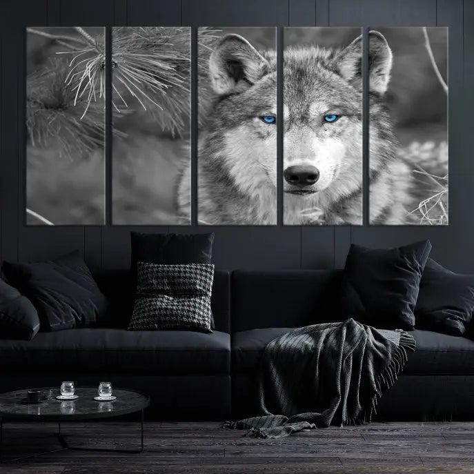 Displayed on the wall is the Wild Wolf Blue Eye Wall Art Canvas Print, a museum-quality triptych featuring a wolf with piercing blue eyes.