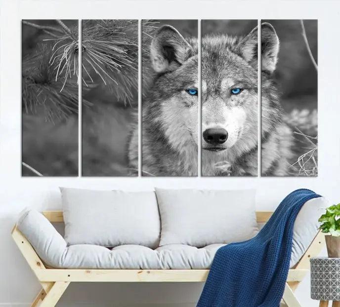 Displayed on the wall is the Wild Wolf Blue Eye Wall Art Canvas Print, a museum-quality triptych featuring a wolf with piercing blue eyes.