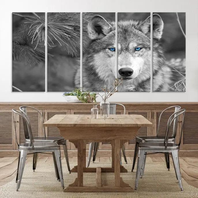 Displayed on the wall is the Wild Wolf Blue Eye Wall Art Canvas Print, a museum-quality triptych featuring a wolf with piercing blue eyes.