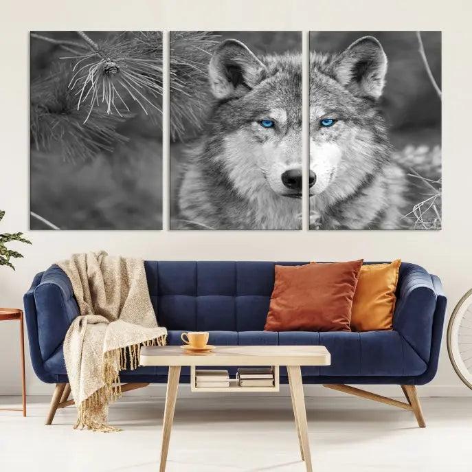 Displayed on the wall is the Wild Wolf Blue Eye Wall Art Canvas Print, a museum-quality triptych featuring a wolf with piercing blue eyes.