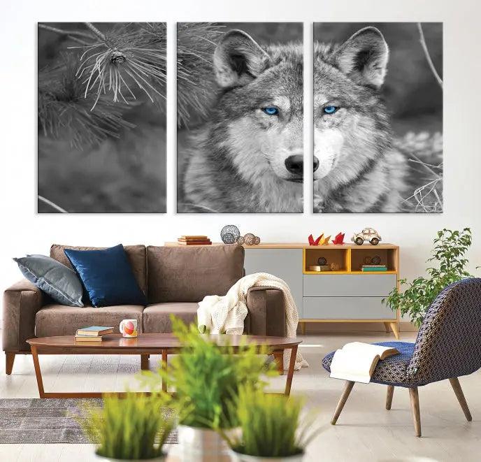 Displayed on the wall is the Wild Wolf Blue Eye Wall Art Canvas Print, a museum-quality triptych featuring a wolf with piercing blue eyes.