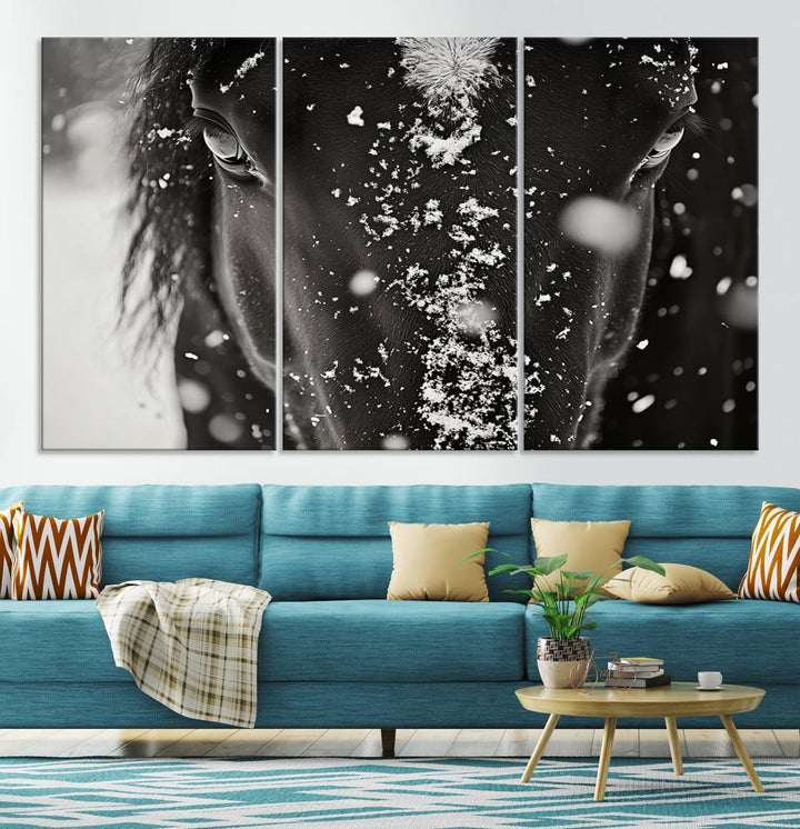 The Winter Horse Snow Wall Art Canvas Print, a black and white triptych showcasing a snow-covered horse's face, infuses the space with rustic cabin decor.