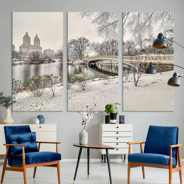 The dining room's winter scene is enhanced by the "Winter Park Wall Art" showcasing The Bow Bridge in Central Park, New York City as a premium canvas print, handcrafted in the USA.