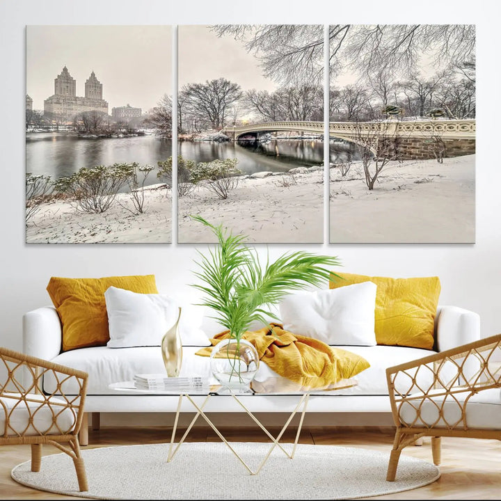 The dining room's winter scene is enhanced by the "Winter Park Wall Art" showcasing The Bow Bridge in Central Park, New York City as a premium canvas print, handcrafted in the USA.