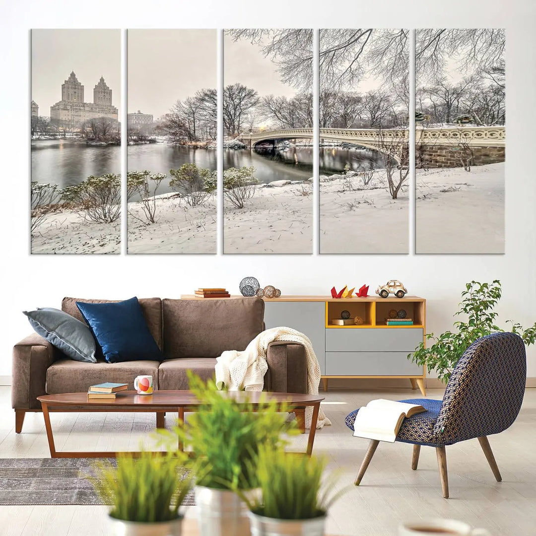 The dining room's winter scene is enhanced by the "Winter Park Wall Art" showcasing The Bow Bridge in Central Park, New York City as a premium canvas print, handcrafted in the USA.