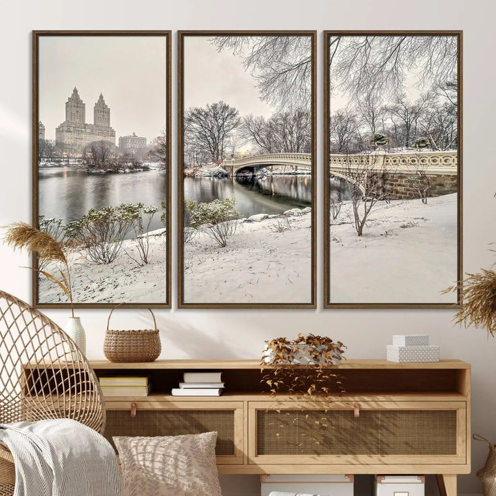 The dining room's winter scene is enhanced by the "Winter Park Wall Art" showcasing The Bow Bridge in Central Park, New York City as a premium canvas print, handcrafted in the USA.