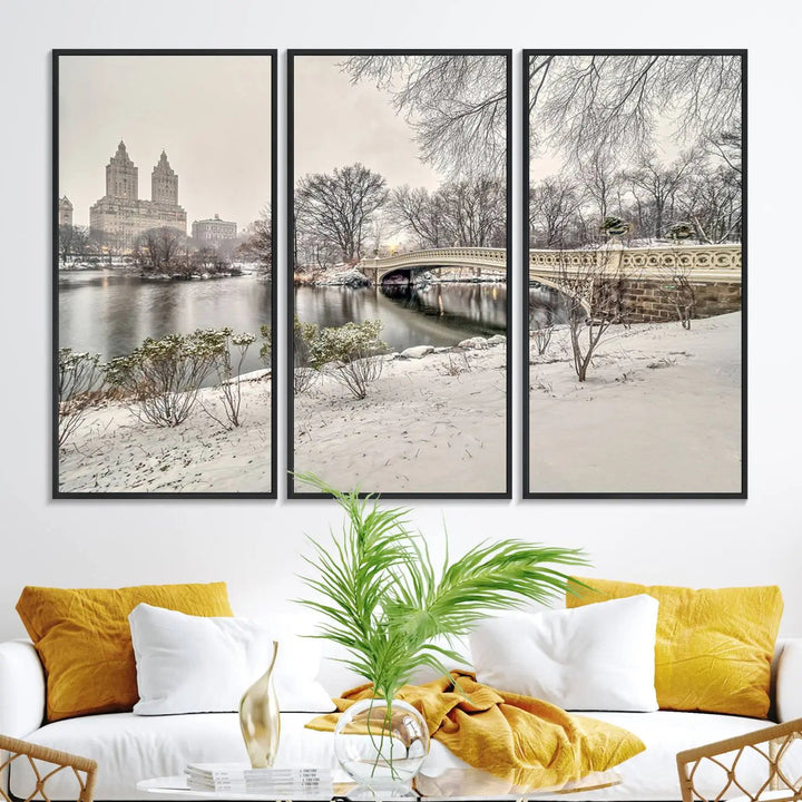 The dining room's winter scene is enhanced by the "Winter Park Wall Art" showcasing The Bow Bridge in Central Park, New York City as a premium canvas print, handcrafted in the USA.