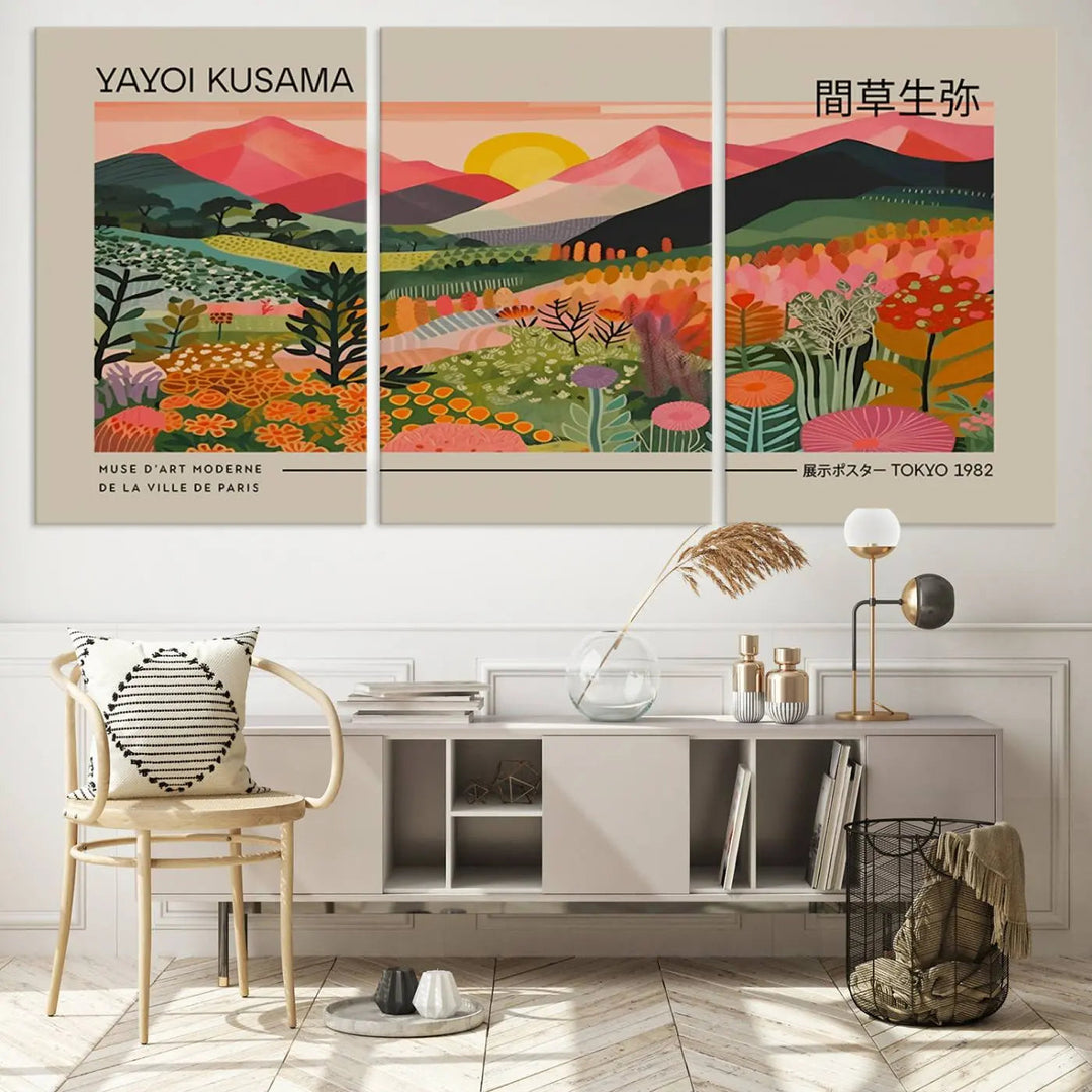 A striking Yayoi Kusama 1986 Wall Art Print - Wabi Sabi Japanese Wall Art Canvas Print featuring a vibrant abstract landscape graces the wall. This artwork brings an infusion of color and creativity to the space.