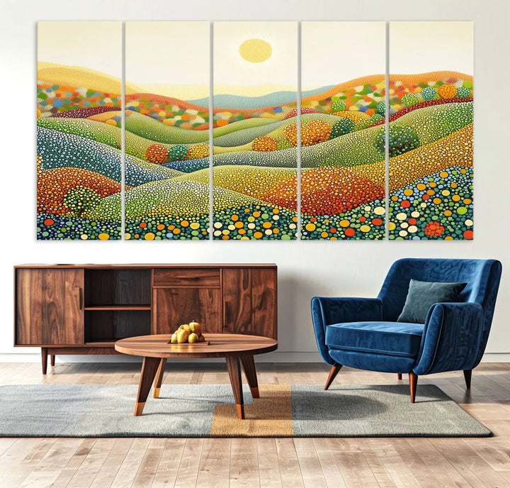 The YAYOI KUSAMA Colorful Dot Art Landscape Canvas, a framed abstract pointillism piece inspired by nature featuring vibrant rolling hills and a sun, adds gallery-quality elegance to your living space.