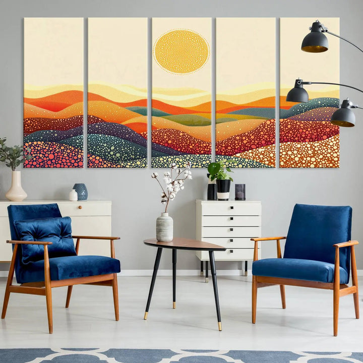 A triptych featuring the YAYOI KUSAMA Colorful Dot Art Landscape Canvas showcases a vibrant abstract pointillism design with rolling hills and a sun. It's mounted on premium canvas and displayed on a dark wall.