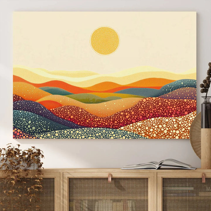 A captivating piece, the YAYOI KUSAMA Colorful Dot Art Landscape Canvas, showcases framed abstract pointillism with vibrant rolling hills and a sun. This handmade wall art is crafted on premium canvas for a gallery-quality finish.