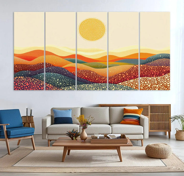 A triptych featuring the YAYOI KUSAMA Colorful Dot Art Landscape Canvas showcases a vibrant abstract pointillism design with rolling hills and a sun. It's mounted on premium canvas and displayed on a dark wall.