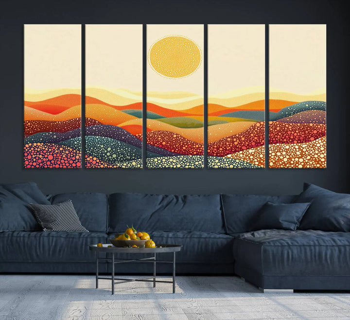 A triptych featuring the YAYOI KUSAMA Colorful Dot Art Landscape Canvas showcases a vibrant abstract pointillism design with rolling hills and a sun. It's mounted on premium canvas and displayed on a dark wall.