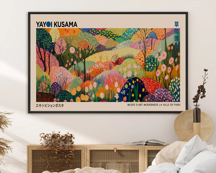 A framed Yayoi Kusama Wall Art Canvas Print features a vibrant abstract landscape adorned with flowers.