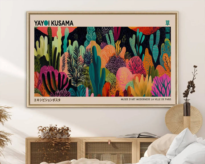 The vibrant canvas print of wall art features abstract plants, with the elegant text "Yayoi Kusama Wall Art Canvas Print" displayed on the colorful frame.