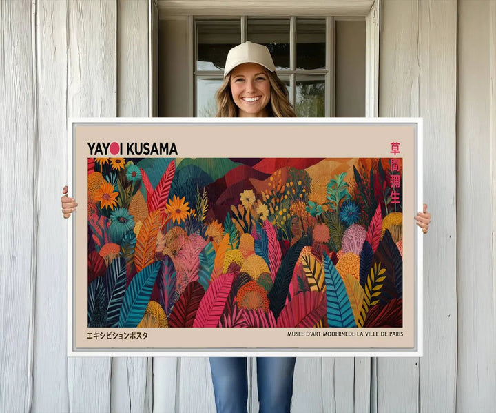 A vibrant Yayoi Kusama Wall Art Canvas Print featuring the text Yayoi Kusama.