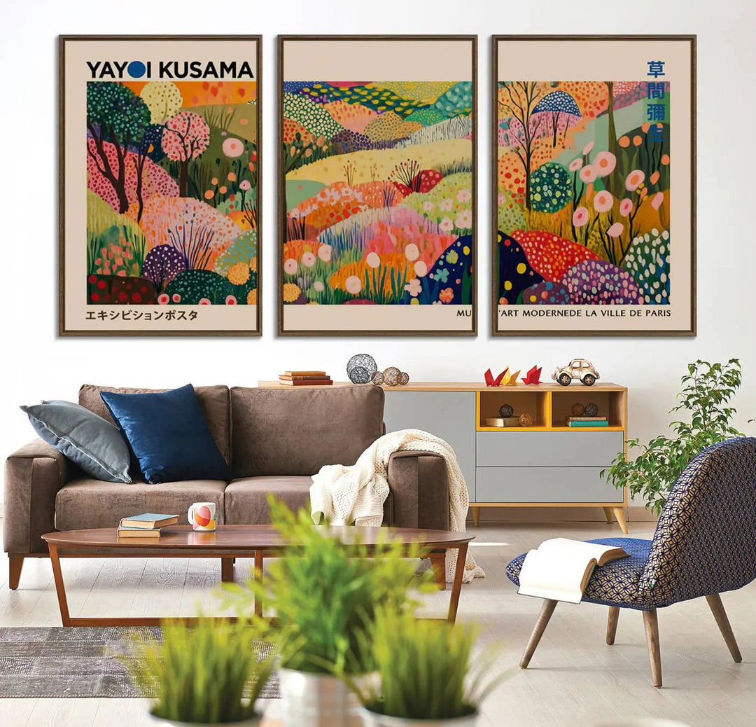 A framed Yayoi Kusama Wall Art Canvas Print features a vibrant abstract landscape adorned with flowers.