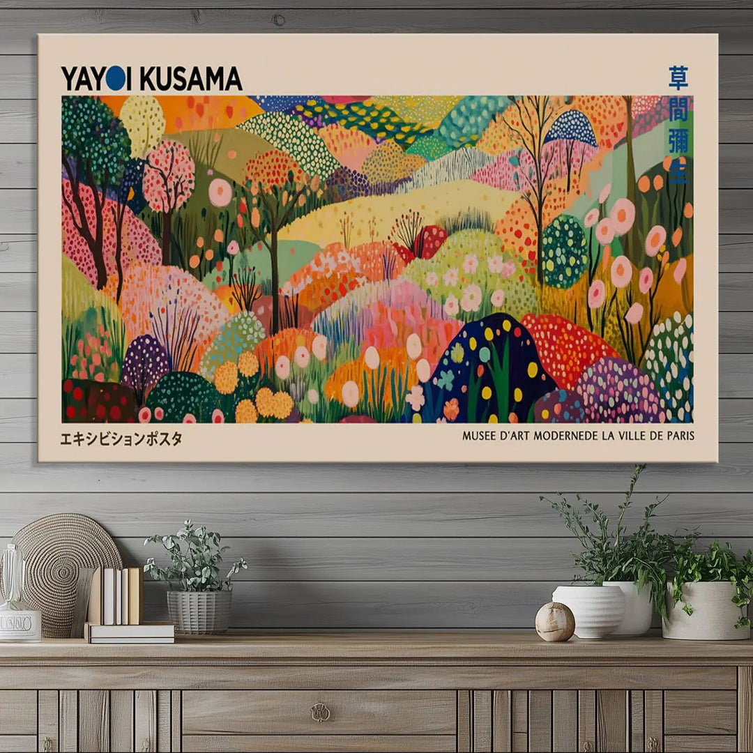 A framed Yayoi Kusama Wall Art Canvas Print features a vibrant abstract landscape adorned with flowers.